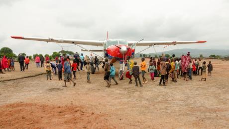 Children came to meet the plane at the Enairebuk airstrip.