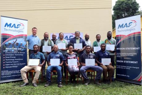 Training Participants posing for a picture after recieving their certification.