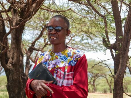 A portrait of Evangelist Elisha Moita
